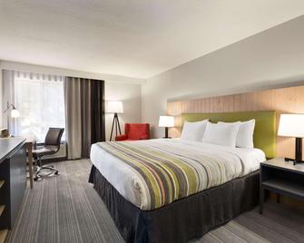 Country Inn & Suites by Radisson Flagstaff, AZ - Flagstaff - Bedroom