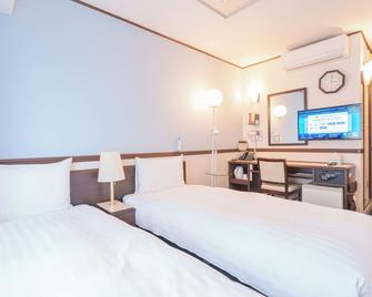 Toyoko Inn Shin-Osaka-eki Higashi-guchi - Osaka - Habitación